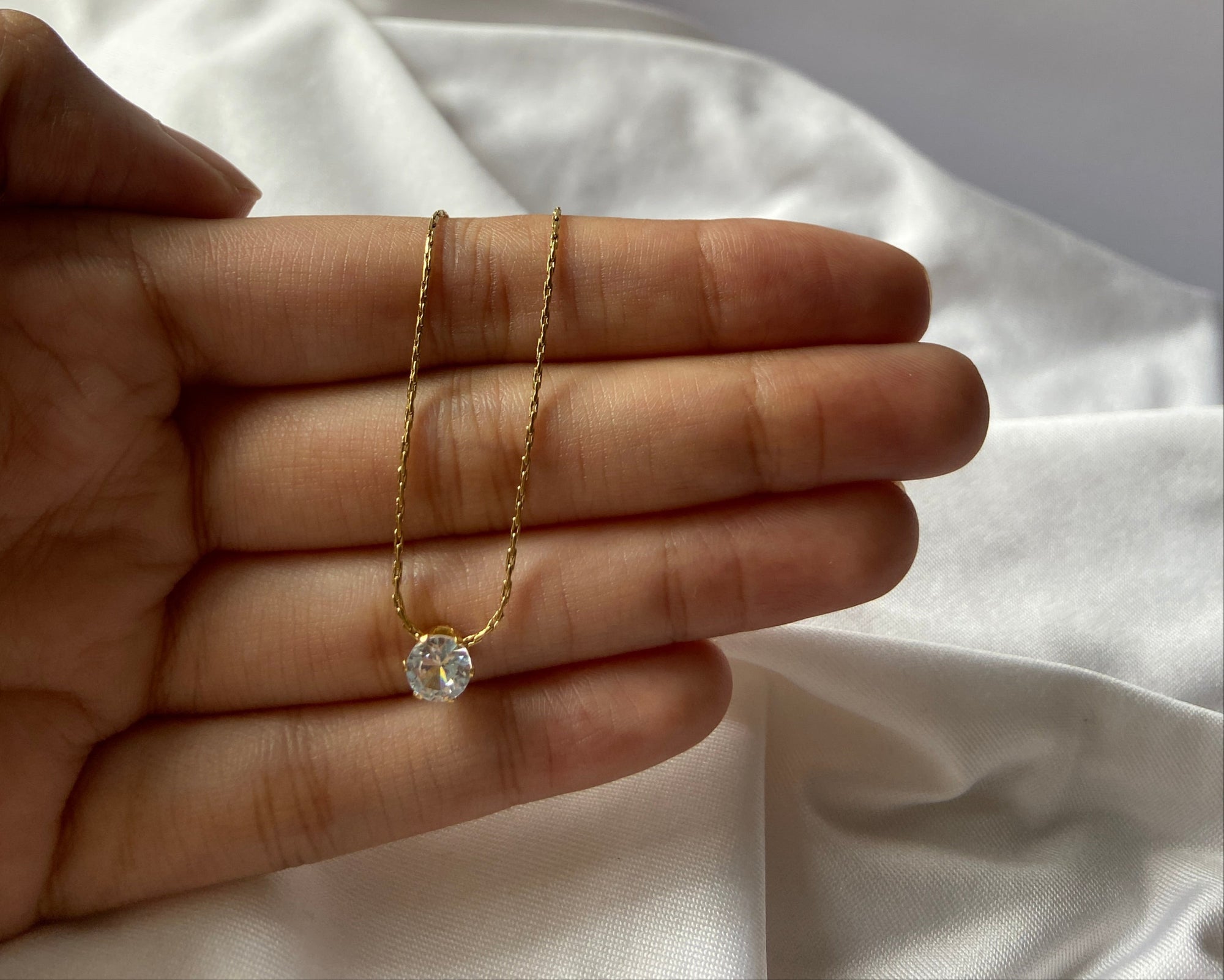 Gold anti tarnish everyday necklace with a diamond pendant 