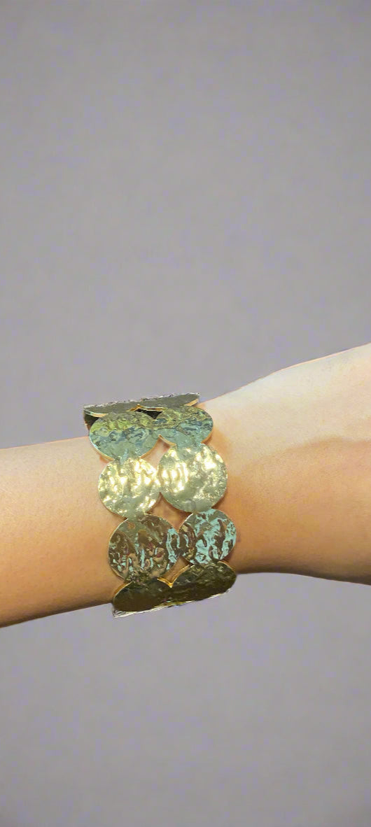 gold coin bracelet on a hand anti tarnish 