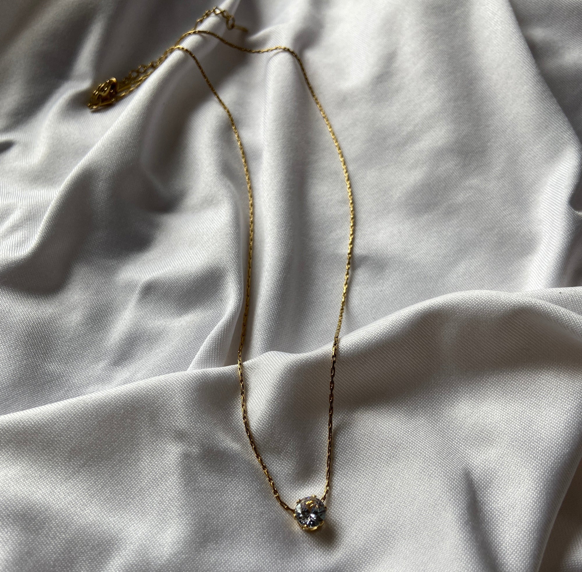 Gold anti tarnish everyday necklace with a diamond pendant 