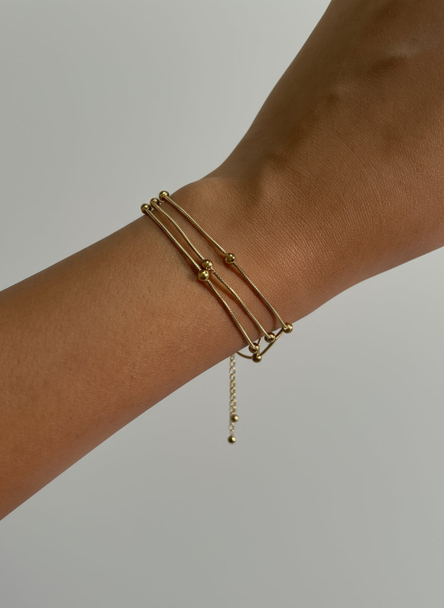 Triple layered anti tarnish bracelet with beads