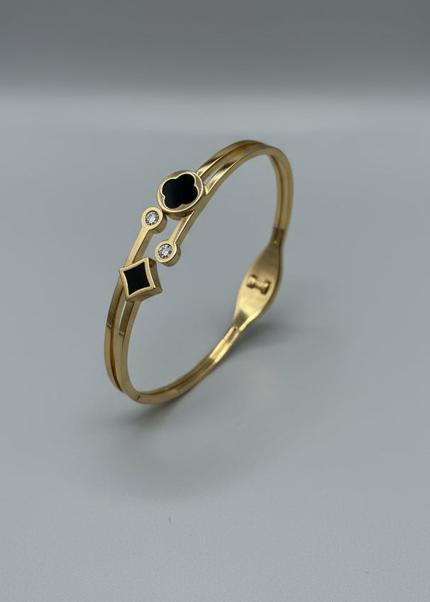 Gold anti tarnish cuff bracelet with black stones and diamond