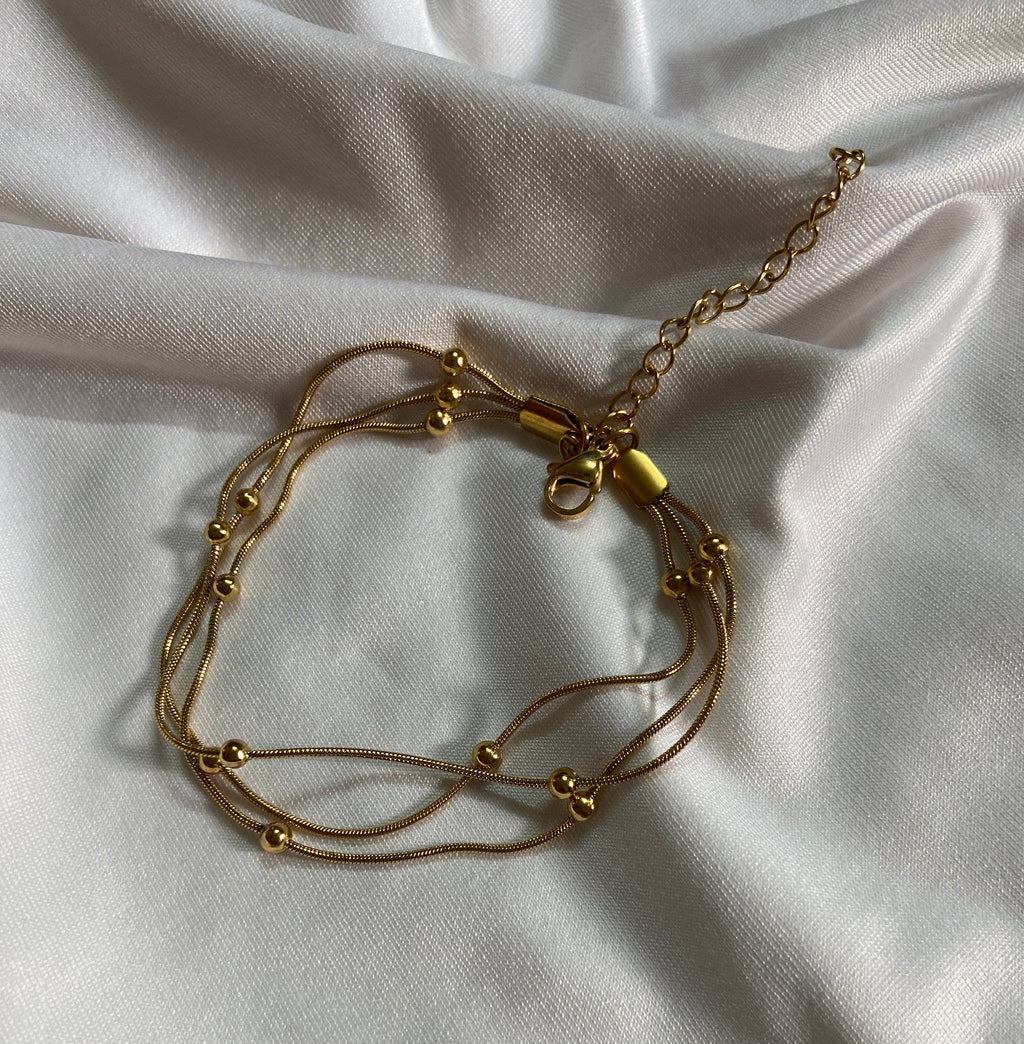 Triple layered anti tarnish bracelet with beads